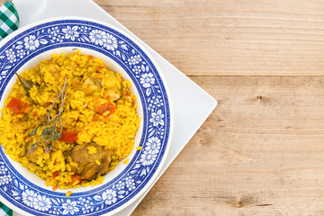 Rice with chicken and vegetables in bowl