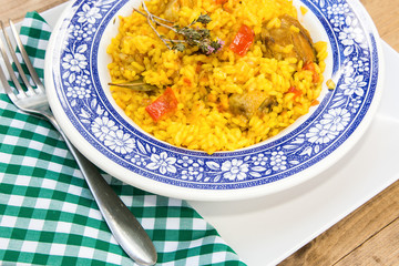 Rice with chicken and vegetables in bowl