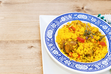 Rice with chicken and vegetables in bowl