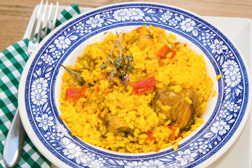 Rice with chicken and vegetables in bowl