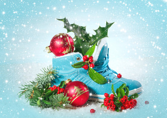 Blue shoe with Holly leaves and berries.
