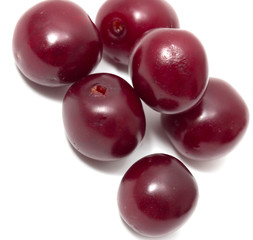 ripe red cherry on a white background