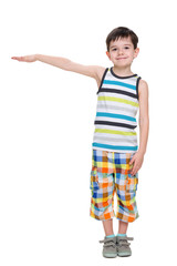 Little boy shows height of something
