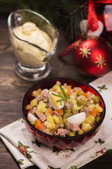 Traditional Russian salad Olivier. New Year food. Christmas background. Selective focus