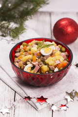 Traditional Russian salad Olivier. New Year food. Christmas background. Selective focus