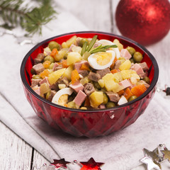 Traditional Russian salad Olivier. New Year food. Christmas background. Selective focus