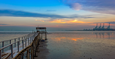 Fototapeta premium Long wooden jetty for fisherman boats