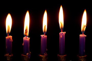 hanukkah candles on black background