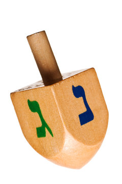 Hanukkah dreidel, isolated on white background.