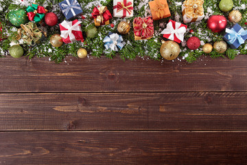 Christmas decorations on wooden board background with copy space