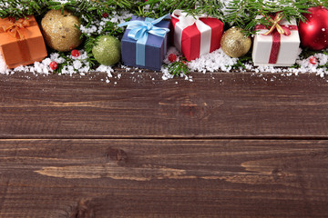 Christmas decorations on wooden board background with copy space