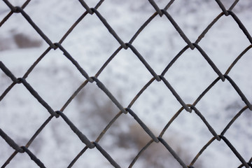 Steel mesh jail fence winter