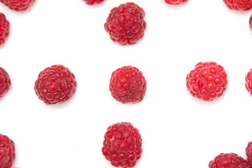 ripe raspberries on a white background