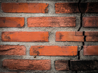 Fototapeta premium A broken old brick wall for background
