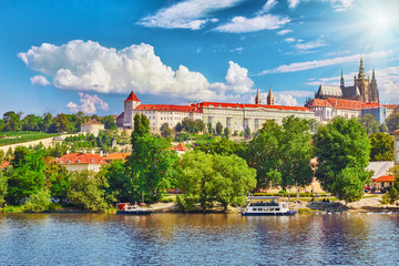 Fototapeta premium View of Prague Castle from waterfront- famous historic bridge th