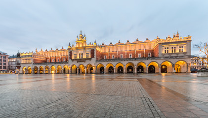 Fototapeta na wymiar Cloth-hall (Sukiennice) in Krakow illuminated in early morning