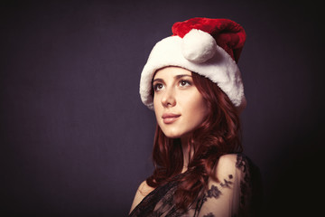 Woman in Santa Claus hat