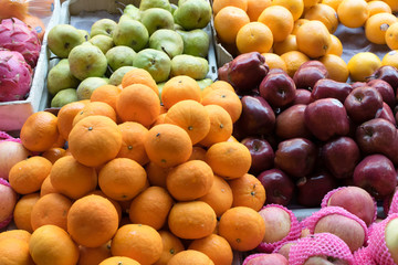 Naklejka na ściany i meble tropical fruits at market in Bali / fruits shop
