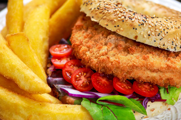 Home made Close up Chicken burger with fried potatoes