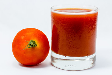 Tomatoes and tomato juice isolated on white background