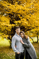 Young couple in the autumn park