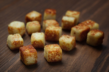 Fried bread cut into cubes for cooking.