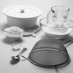 Home baking dumpling mix ingredients and utensils on a kitchen worktop.