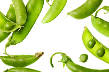 green pea pods isolated on white background