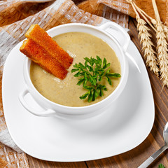 Vegetable soup with spices and fried bread.
