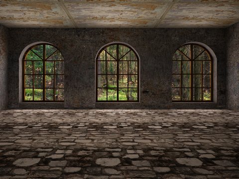 Large, empty, abandoned room with large arc windows and stone floor