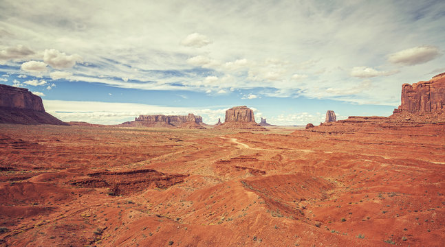 Vintage old film style photo of Monument Valley, USA.