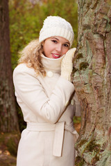 Portrait of a blond curly girl