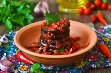 Pickled, spicy eggplant with tomato sauce with pepper