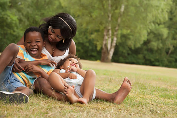 Mother plays with her children