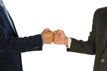 two businessmen greeting with a fist bump isolated
