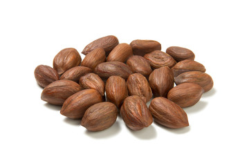 Hazelnuts over white background
