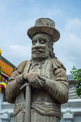 Fototapeta na wymiar Ancient statues in temple of bangkok,thailand