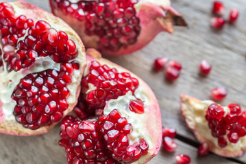 Pomegranate on the wooden background