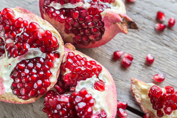 Pomegranate on the wooden background