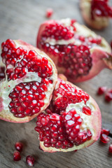 Pomegranate on the wooden background