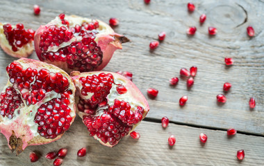 Pomegranate on the wooden background