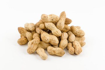 peanut hill in a shell lies on a white background