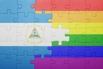 puzzle with the national flag of nicaragua and gay flag