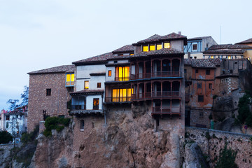 Hanging houses on rocks in twilight. Cuenca