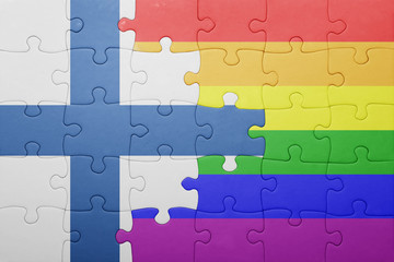 puzzle with the national flag of finland and gay flag
