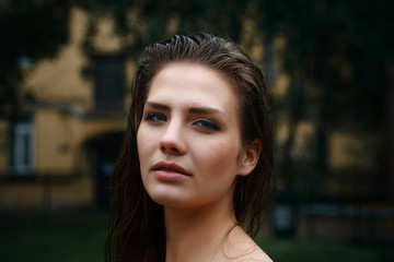 Natural female beauty in summer rain