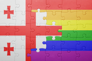 puzzle with the national flag of georgia and gay flag