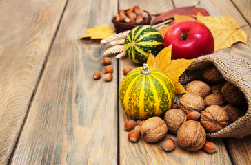 Fototapeta na wymiar autumn pumpkins and nuts