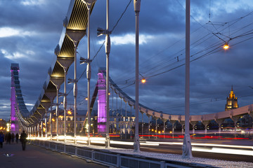 The steel suspension Krymsky Bridge at night in Moscow, Russia