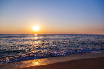 Fototapeta na wymiar beach sand sea sky sun sunset